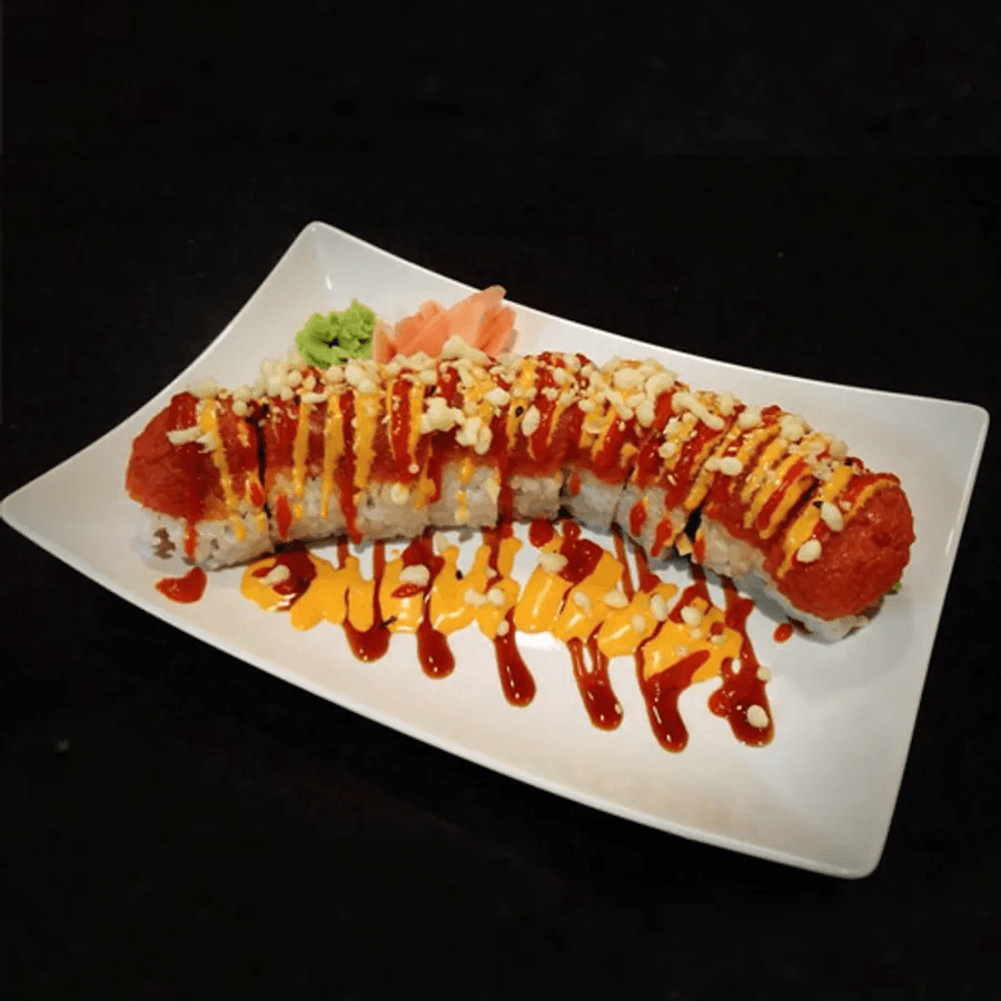 Sushi roll plated with sauces at Wabi Sabi